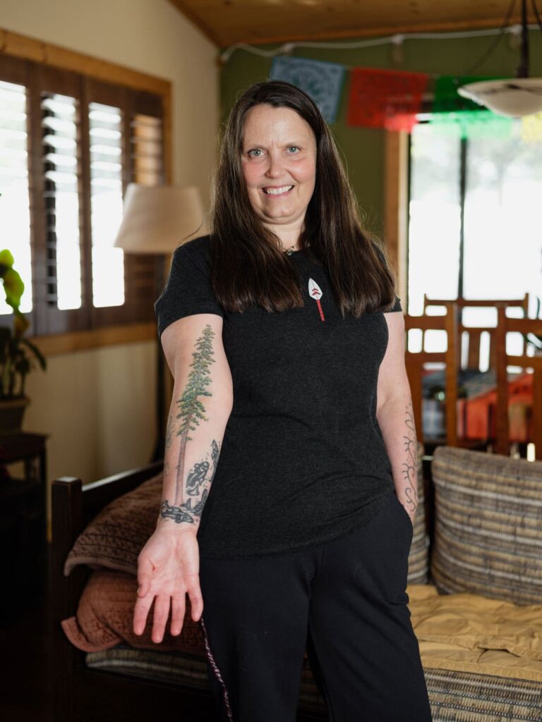 Wendy showing off her redwoods ecosystem tattoo