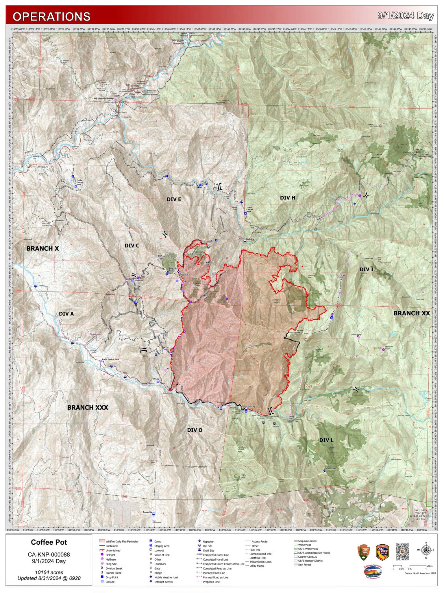Overhead of a map showing acreage burned by a fire in red